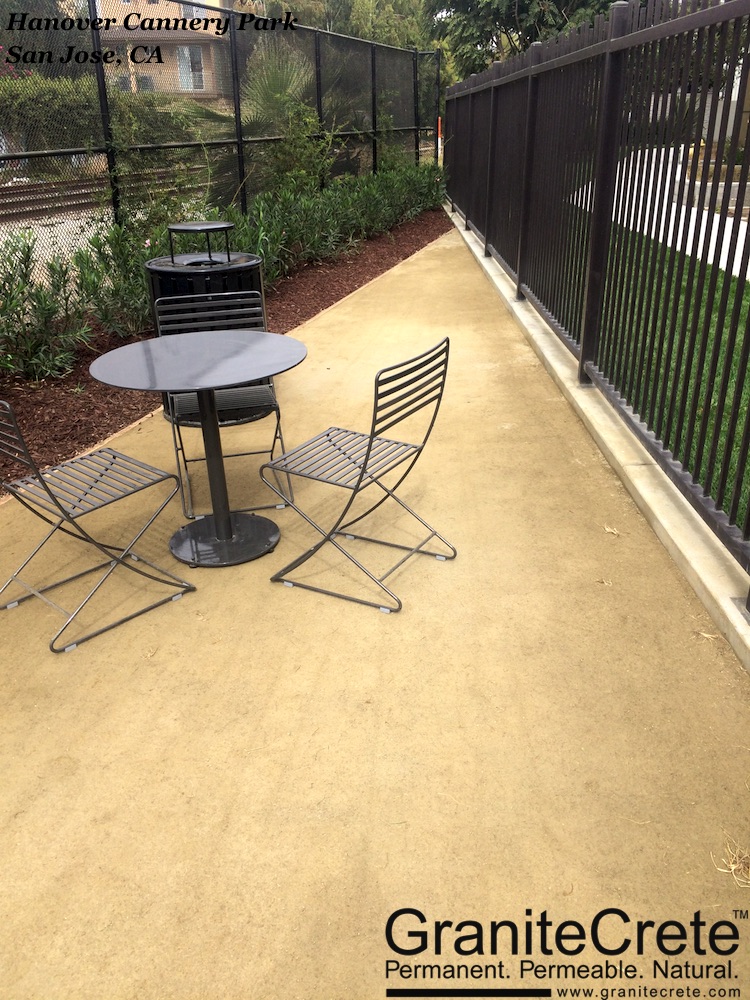 GraniteCrete permeable paving installation with table and chairs at Hanover Cannery Park in San Jose.